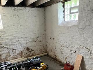 Interior Perimeter Basement Waterproofing System Installed in New Paris, Ohio