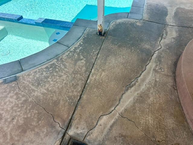 Pool Deck Crack Repair and Concrete Restoration in San Diego, CA - Before Photo