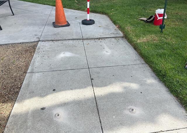 Commercial Sidewalk Concrete Leveling at Hampton Inn & Suites in Poway, CA - Before Photo