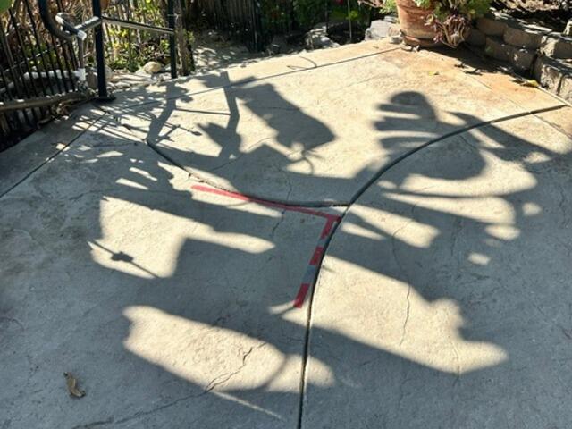 Concrete Leveling and Crack & Joint Sealant for Patio in Riverside, CA - Before Photo