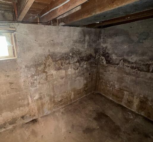Basement Waterproofing in Burke, NY - Before Photo