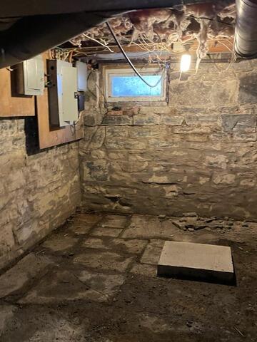 Basement Waterproofing in Auburn, NY - Before Photo