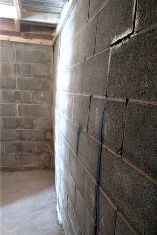 Foundation Wall Support in LaFayette, NY - Before Photo