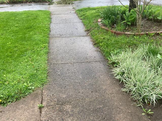 Sidewalk Concrete Repair in Baldwinsville, NY - Before Photo