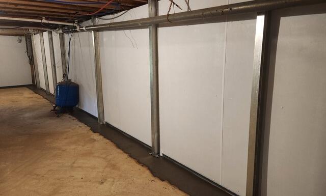 Salisbury Center, NY, Foundation Repair and Basement Waterproofing Solutions - Before Photo