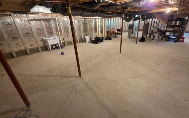 Basement Floor Crack Repair in Hilton, NY - Before Photo