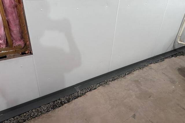 Basement Waterproofing System Installation in Camillus, NY - After Photo