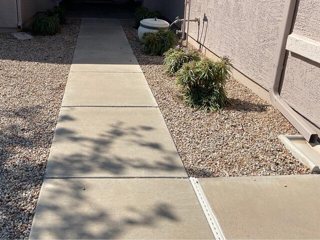 Smooth & Sealed Walkway Restoration in Gilbert, AZ - Before Photo