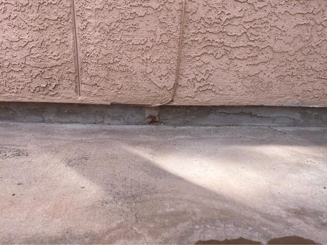 Exterior Concrete Stem Wall Repair in Tucson, AZ - Before Photo