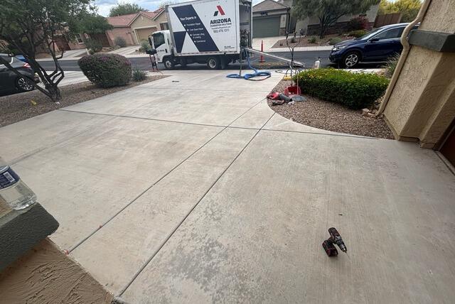 Concrete Driveway Joint Sealing & Crack Repair with NexusPro in Tucson, AZ - Before Photo