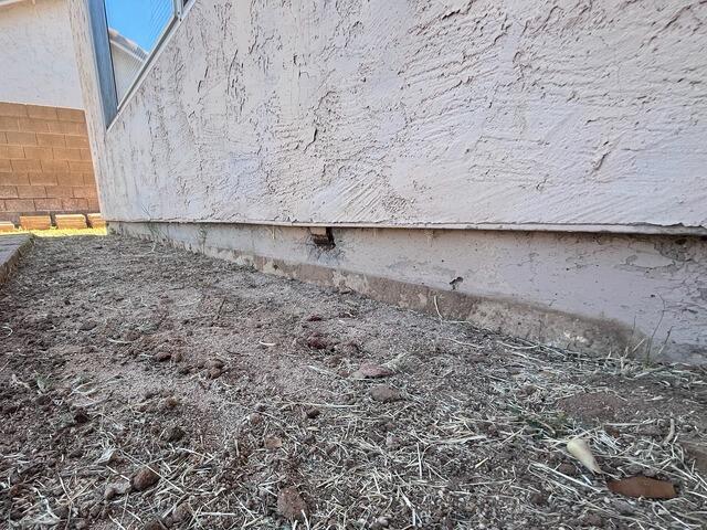 Long Exterior Stem Wall Repair and Foundation Restoration in Chandler, AZ - Before Photo