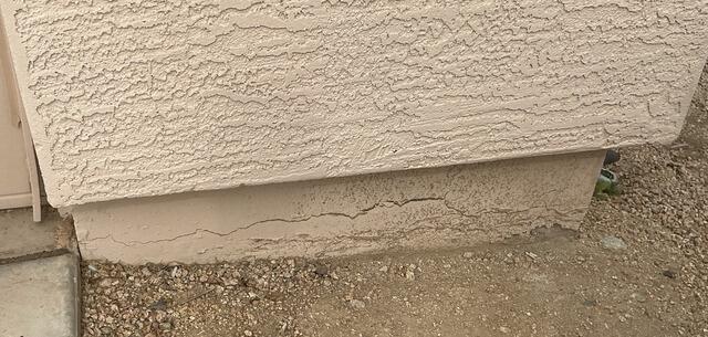 Garage Corner Stem Wall Repair Completed in Buckeye, AZ - Before Photo