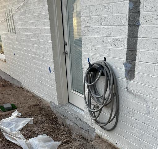 Scottsdale, AZ Stem Wall Repair Near Exterior Entryway - Before Photo