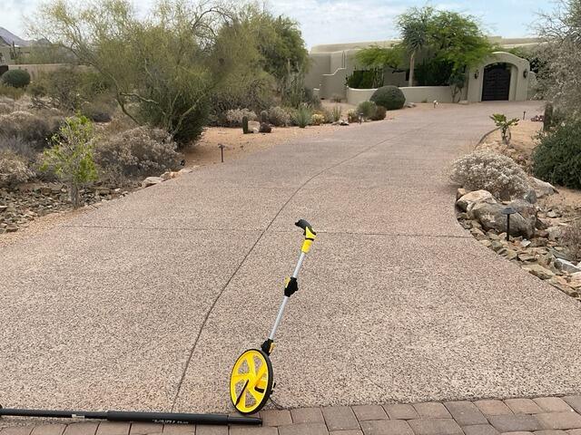 Concrete Lifting & Joint Sealant Repair in Scottsdale, AZ | Before & After Driveway Restoration - Before Photo