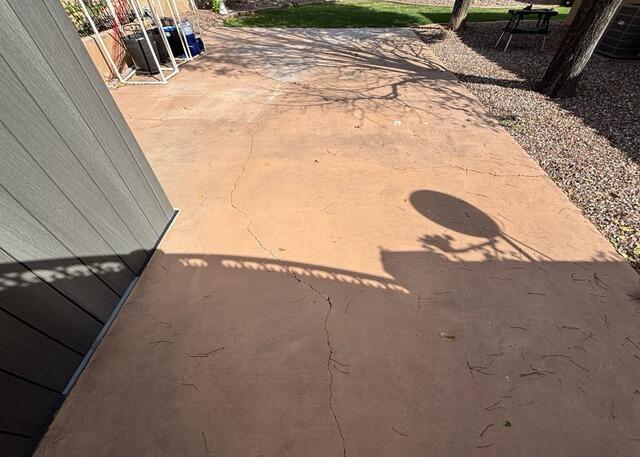 Concrete Patio Leveling and Crack Sealing in Phoenix, AZ - Before Photo