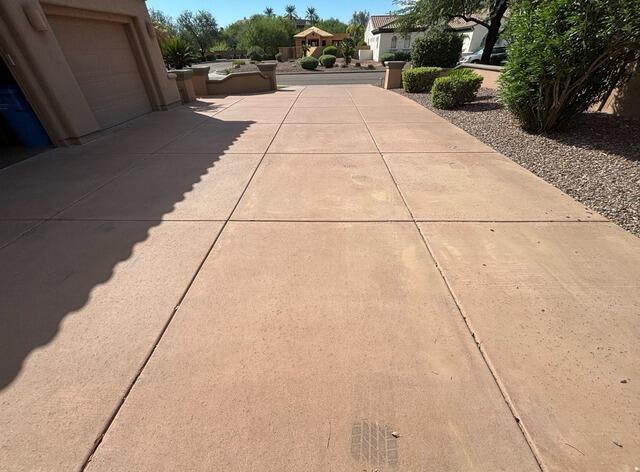 Concrete Driveway Leveling and Joint Sealing in Phoenix, AZ - Before Photo