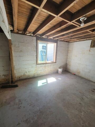 Basement Wall Reinforcement And Waterproofing In Carey, ID - Before Photo