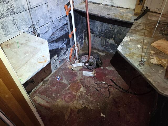Leaky Sump Pump In Anchorage, AK - Before Photo