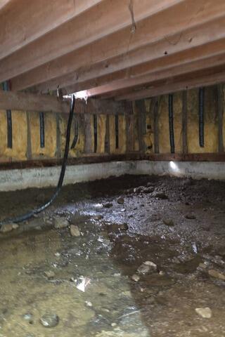 Flooding Crawl Space in Anchorage, AK - Before Photo