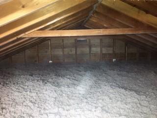 Endicott, NY Open Blowing TruSoft Insulation Into An Attic Flat