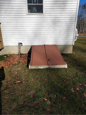 An Exterior Basement Entrance in Saco - Before Photo