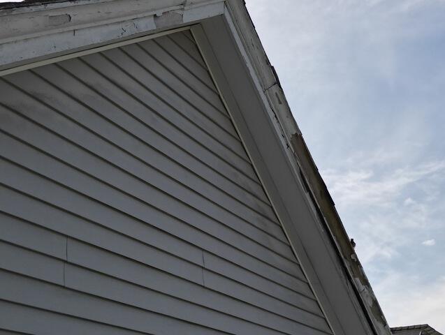 Siding Replacement in Lowell, MA - Before Photo