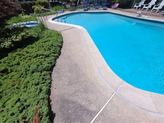Pool Deck Crack Repair in Duxbury, MA - Before Photo