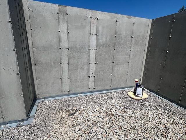 Installing a Waterproofing System Before Pouring Foundation Floor in Chester, NH