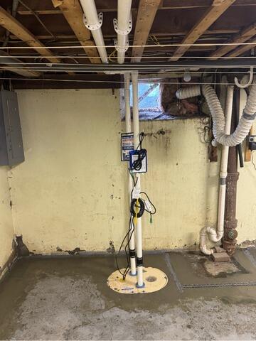 Replacing a Failing Sump Pump with Reliable Sump Pump and Drainage System in Manchester, NH