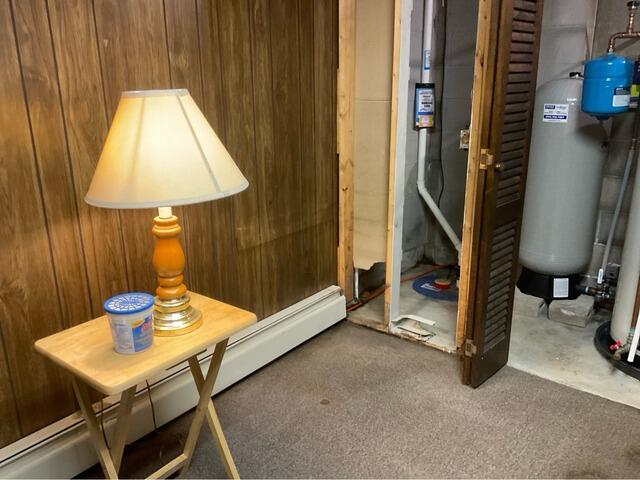 Waterproofing a Finished Basement in Chester, NH - Before Photo