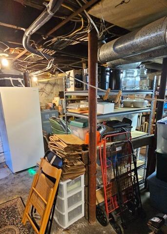 Replacing Failing Lally Columns to Stabilize Floors in Medford, MA - Before Photo