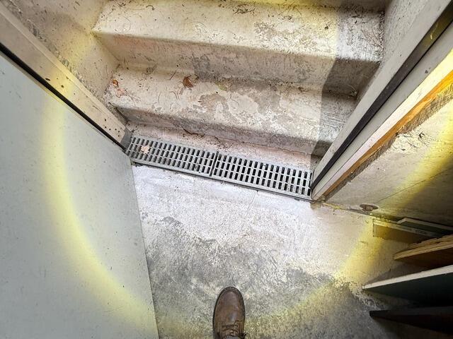 Radon Sealed Waterproofing System in Exeter, NH - Before Photo