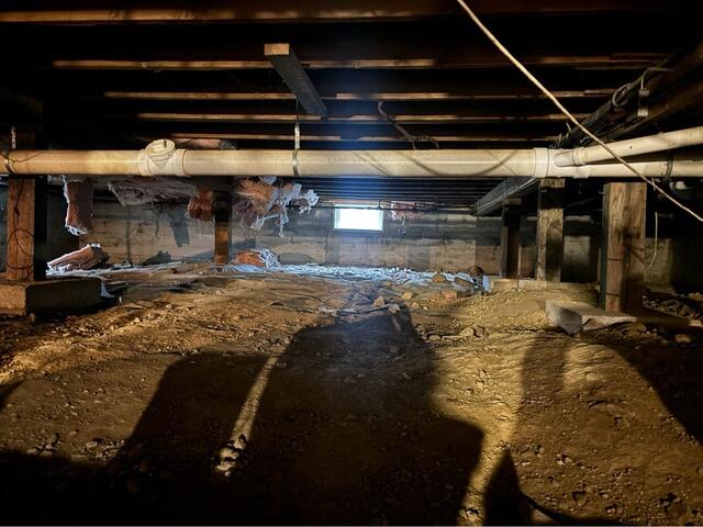 Waterproofing a Wet Crawl Space in Ipswich, MA - Before Photo
