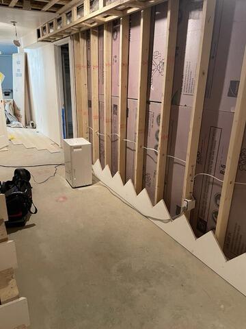 Humid Basement Repair in Exeter, NH - Before Photo
