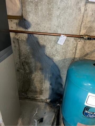 Leaking Basement Crack Repair in New Boston, NH - Before Photo