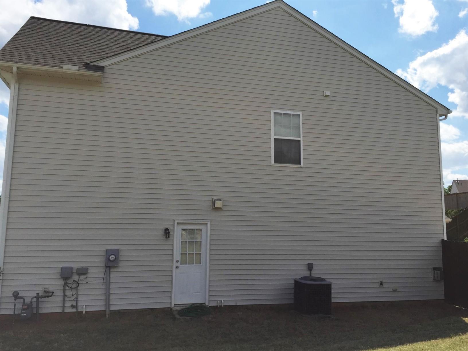 Mighty Dog Roofing Before & After Photo Set Siding Replaced in Greer