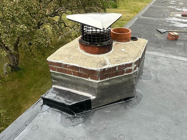 Watertight Again: Chimney Leak Repaired on EPDM Roof in Woodbury, CT - After Photo