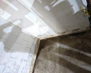 Solving Water Intrusion with Our Interior Drainage System