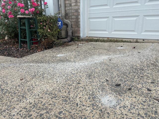 Settling Concrete Driveway Lifted and Restored in Ashburn,VA