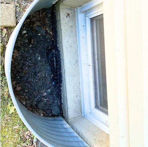 Window Well Drainage installed in Bristow, VA - Before Photo