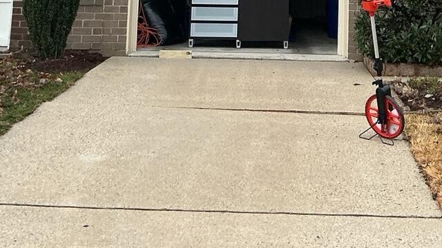 Concrete Driveway Leveling in Alexandria, VA - Before Photo