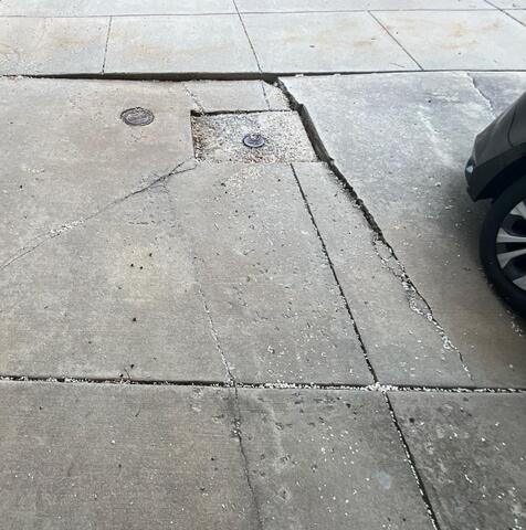 Driveway Repair in Clarksburg, MD: Eliminating Cracks and Tripping Hazards with PolyLevel - Before Photo