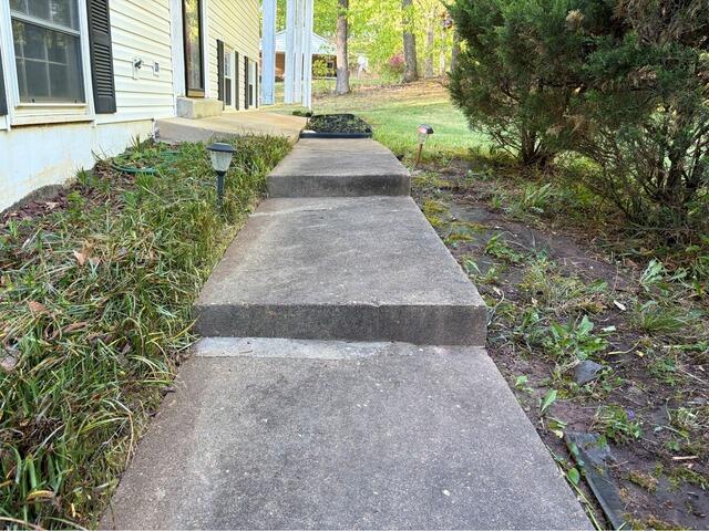Concrete sidewalk leveling in Manassas, VA - Before Photo