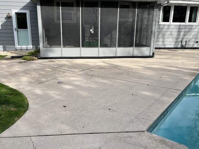 Concrete Pool Deck Leveling and Crack Repair in Highland, MD - Before Photo