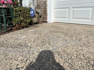 Settling Concrete Driveway Lifted and Restored in Ashburn,VA