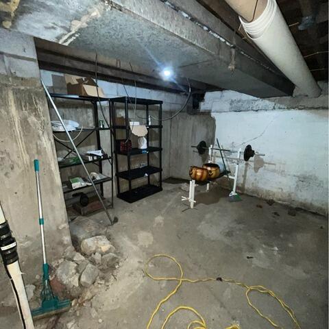 Dunkirk Basement Waterproofing Transformation - Before Photo