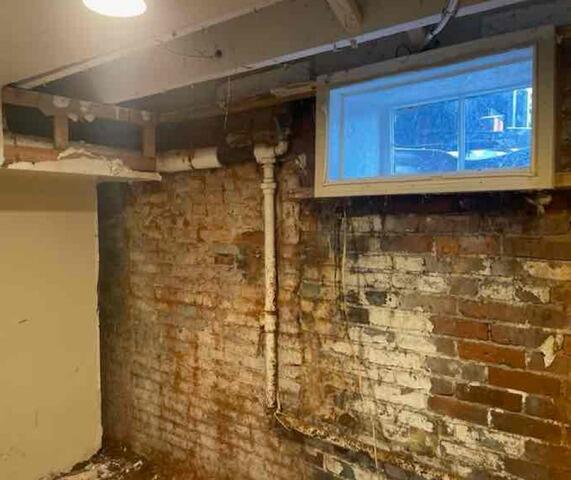 Foundation Wall Stabilization in Winona Lake, IN - Before Photo