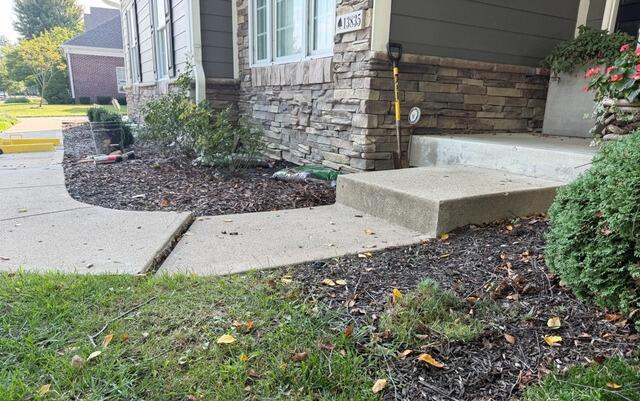 Sinking Sidewalk Repair in McCordsville, IN - Before Photo