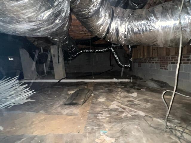 Cary, NC Crawl Space Encapsulation & Sump Pump Installation - Permanent Moisture Control Solutions - Before Photo