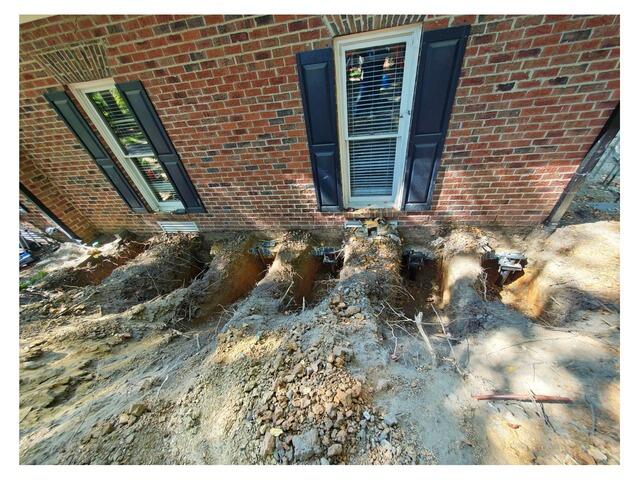 Helical Pier Installation to Stabilize Settling Foundation - Cary, NC
